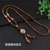 Collar de cuentas con amuleto de la paz estilo vintage con diseños de Bodhi y loto, accesorio de ropa de algodón y lino, collar largo con cuentas de ala de pollo