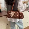 Bolso de hombro de gamuza nuevo, moderno y exquisito para el otoño de 2026, bolso de mano versátil de lunares estilo coreano para mujer, adecuado para ir al trabajo.