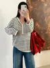 Suéter de punto a rayas con capucha versátil para mujer de talla grande 2026 otoño casual suelto para mujer de talla grande