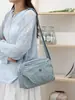 Bolso pequeño ligero de nailon para mujer, estilo nuevo 2026, versátil para el uso diario, bolso cruzado impermeable