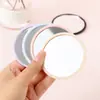 Espejo de maquillaje minimalista, mini, portátil, redondo, de una sola cara, para estudiantes, de bolsillo, con estampado publicitario impreso, pequeño.