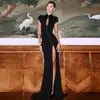 Comercio Exterior Estilo Europeo y Americano Otoño e Invierno Nueva Moda para Mujer Vestido Sexy de Color Sólido con Abertura Alta, Cuello Alto, Huecos y Corte Ajustado para Mujer