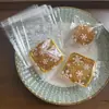 Bolsas Adhesivas de Flor de Cerezo Semitransparentes Escarchadas en Stock para Empaque de Productos Horneados, Bolsas para Empaque de Repostería de Copo de Nieve, Venta al por Mayor desde el Fabricante