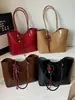 Bolso bandolera simple de gran capacidad para el día a día, nuevo modelo principios de otoño 2026, bolso tote de color liso único y dulce, bolso de hombro elegante