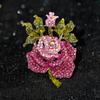Moda europea y americana broche de rosa de aleación con diamantes de imitación ramillete de planta de alta gama accesorios de ropa de moda coreana fábrica