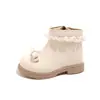 Venta al por mayor Envío directo Moda Nueva Invierno 2026 Niñas Niños Botines Cortos con Lazo Estilo Coreano Princesa Suela Suave Botas de Piel