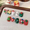 Accesorios Populares para Uñas de Navidad Campana Alce Muñeco de Nieve Muletas Tridimensional Lindo Dibujo Animado Versátil Decoración de Uñas Mayoreo