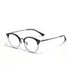 Nuevas Gafas Redondas Pequeñas Rojas Mismo Estilo Marco Metálico de Titanio Ceja Marco TR Retro Personalizadas Lentes Planas Moda para Mujer