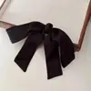 Acessório de Cabelo Elegante Coque Baixo Laço de Cetim Preto Presilha de Mola Novo Estilo 2025 Grampo de Rabo de Cavalo para Mulheres