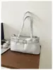 Bolso de axila de nicho estilo coreano para mujer, nuevo bolso de hombro de moda diaria 2026, bolso de mano simple y versátil