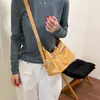 Bolso retro de axila estilo coreano para mujer, colección otoño e invierno 2026, bolso de motero con múltiples bolsillos estilo "chica picante", bolso de hombro y cruzado a la moda