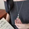 Estilo minimalista~Collar largo de metal con colgante de pez para mujer, nuevo modelo de verano, cadena para clavícula con cordón negro, accesorio versátil