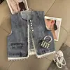 Colete Jeans Sem Mangas Patchwork de Renda Estilo Francês Primavera 2026 para Mulheres, Top Versátil Elegante e Emagrecedor