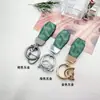 Nuevo Colgante para Llavero de Coche Estilo Francés Accesorios de Regalo de Alta Gama Adornos Regalos Metal Fábrica Creativa Mayoreo