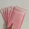 Ventas directas del fabricante: Bolsas de burbujas de colores, bolsas de embalaje para express engrosadas a prueba de golpes y resistentes a la presión, bolsas para express de película coextruida con película perlada