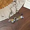 Pendientes Colgantes Redondos de Piedra Estilo Étnico con Borlas, Lujo Ligero y Sensación de Alta Gama, Pendientes Personalizados Estilo Chino Nuevo al por Mayor para Mujeres