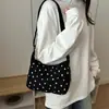 Bolso de mujer de alta gama, nuevo modelo primavera 2026, bolso de axila para el día a día, diseño de nicho moderno y simple, bolso de hombro y cruzado