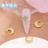 Popular en línea popular joyería para uñas chapada en oro circonita gota de agua joyería para uñas de alta gama exquisita estrella Luna diamante para uñas al por mayor