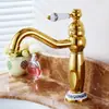 Torneira de cobre puro banhada a ouro antigo estilo europeu toda em cobre quente e frio de alavanca única furo único rotativa para lavatório