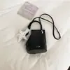 Bolso tipo cubo de estilo nicho transfronterizo para mujer, nueva moda 2026, versátil, para hombro, cruzado y de mano, bolso de hombro casual