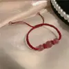 Mi nombre es Flor de durazno Zhao pulsera de cristal de fresa en la orilla cuerda de mano tejida de cristal rojo paloma adornos de mano para amantes novias fuera de un solo uso