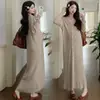 Saia de Tricô para Gestantes 2025 Nova Primavera Moda Coreana Elegante de Botão Único Decote V Skinny Vestido Base Tendência