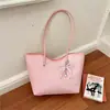Bolso tote de lujo ligero de alta gama, bolso retro de nicho para el día a día, nuevo estilo 2026, estilo coreano, gran capacidad, bolso de hombro simple