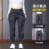 Pantalones casuales para hombre con cremallera de bolsillo transfronteriza, pantalones versátiles de pierna recta holgados de negocios de alta gama para hombre, pantalones largos de primavera y otoño para hombre