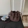 Bolso Cubo con Borlas Estilo Coreano 2026 Nuevo Llegado de Otoño Color Sólido Bolso de Hombro Cruzado Personalidad de Alta Estética Nicho Bolso con Cordón