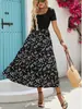 Vestido de Verano 2026 Nuevo Estilo Europeo y Americano con Estampado y Patchwork, Corte A para Mujer, Elegante y Adelgazante, Vestido Largo, Artículo Popular Transfronterizo