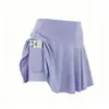 La falda plisada de secado rápido más vendida de Xiyin, falda deportiva de imitación de dos piezas con bolsillo para mujer, falda de cintura alta adelgazante para golf y yoga
