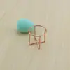 Suministro de Mini Estante de Almacenamiento para Polvera de Metal Forma de Calabaza Gota de Agua Soporte para Esponja de Lavado Facial Secador de Huevo de Maquillaje Soporte para Polvera