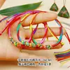 Bolsitas tejidas hechas a mano más vendidas para niños y adultos, Pulseras de Zongzi de Tigre con Cascabeles, Pulseras de Hilo Colorido para el Festival del Bote del Dragón 2026