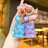 Tendencia Nacional Figura de León Dibujo Animado Llavero Colgante de León Mochila de Estudiante Adorno de Cristal Transparente Llavero al por Mayor
