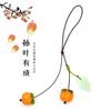 La carrera de Guofeng se ha convertido en un colgante para teléfono móvil de caqui de cristal, todo colgante de deseos, joyería retro hermosa chica japonesa