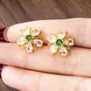 Nuevos Pendientes de Flor de Circonita de Moda Versátiles Oro de Arena Vietnamita Estilo de Lujo Ligero Pendientes Pequeños de Flor para Mujer Joyería Transfronteriza Venta Directa