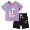 Camiseta infantil 2022 TikTok verão nova vestuário infantil de comércio exterior roupas infantis coreanas calça de manga curta terno de duas peças
