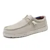Mocasines de hombre talla grande transfronterizos, zapatos casuales de moda coreana modernos para hombre, zapatos de lona slip-on transpirables y ligeros