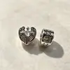 Nuevo diseño transfronterizo: Cuentas con forma de corazón y cruz con agujeros grandes, cuentas con forma de ala de ángel y corazón con agujeros pasantes, cuentas que conservan el color, marca Zhongxing