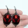Nuevos pendientes y colgantes góticos de cruz y cuervo vintage transfronterizos europeos y americanos para Halloween