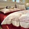 Nuevo juego de cuatro piezas jacquard teñido en hilo de alto peso, estilo simple y fresco, ropa de cama estilo princesa de lujo ligero
