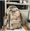 Mochila Nueva Casual Transfronteriza de Gran Capacidad Ligera, Mismo Estilo Outdoor Impermeable de Nylon para Estudiantes Hombres y Mujeres