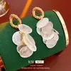 Pendientes de Borla de Concha Redonda Aguja de Plata Pendientes de Moda Joker para Vacaciones Lujo Ligero Sentido de Alta Gama Pendientes de Nicho Venta al por Mayor