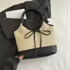 Bolsa de Ombro Feminina Verão 2025 com Laço Sob o Braço Moda Casual Grande Capacidade Bolsa de Mão Nicho Palha Cor Contrastante Bolsa de Ombro