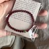 Pulsera de cuentas de jade de imitación rojo granate chino, más cálida como el jade, nueva pulsera retro simple de alta gama para mujer