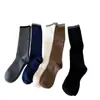 Tacto Súper Suave 2025 Otoño e Invierno Nuevos Calcetines de Lana Cálida de Color Sólido para Mujer Tipo JK Holgados de Tubo Largo Venta al por Mayor