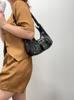 Bolso de motocicleta de gran capacidad para mujer 2025 nuevo bolso dumpling de moda que combina con todo bolso de axila bolso de hombro mensajero