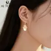 Las Joyas Aitong Están Diseñadas con un Sentido de Lujo Ligero y una Sensación de Alta Gama, Presentando Deslumbrantes Pendientes de Flor de Nicho, Pendientes de Perla con Borlas