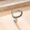 Anillo de moda transfronterizo de acero inoxidable con apertura irregular de línea de presión de aceite diseño de nicho fabricantes de joyería de acero de titanio