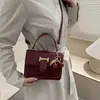 Bolso de Mano de Color Sólido Simple y Elegante 2026 Primavera Nuevo Casual Chic Hombro Cruzado Pequeño Cuadrado para Mujer